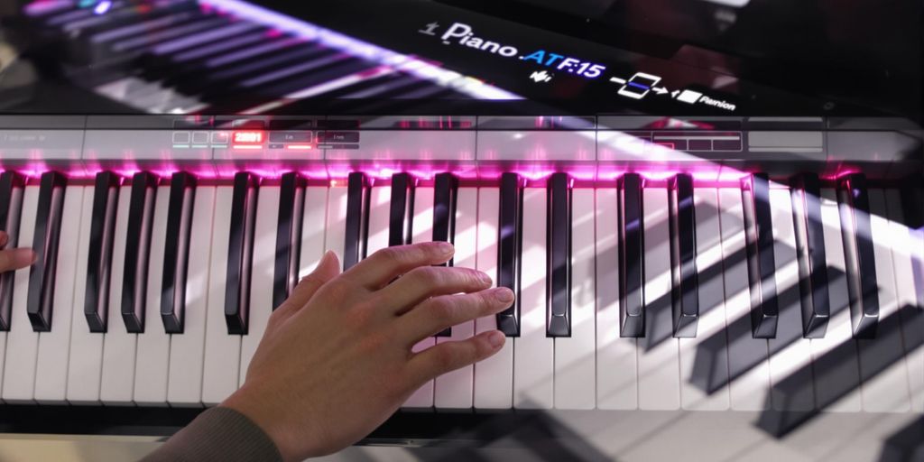Person playing a digital piano with AI interface.